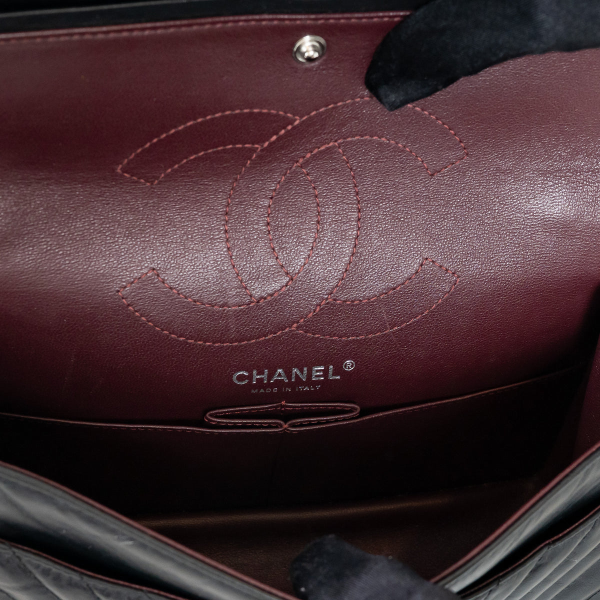 Pre-Loved Chanel™ Black Aged Lambskin Chevron Medium 2.55 Double Flap Bag