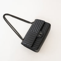Pre-Loved Chanel™ Black Aged Lambskin Chevron Medium 2.55 Double Flap Bag