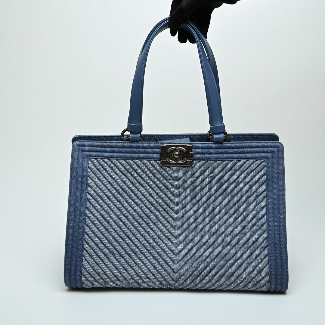 Pre-Loved Chanel™ Blue Quilted Chevron Denim Boy Tote Bag