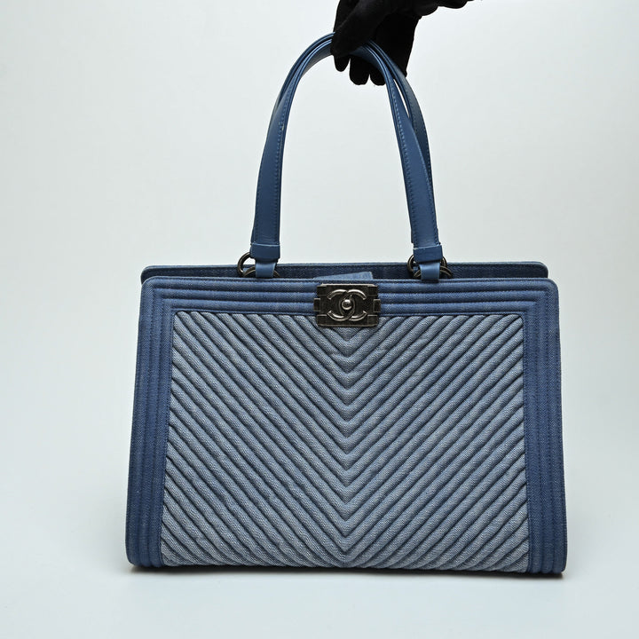 Pre-Loved Chanel™ Blue Quilted Chevron Denim Boy Tote Bag