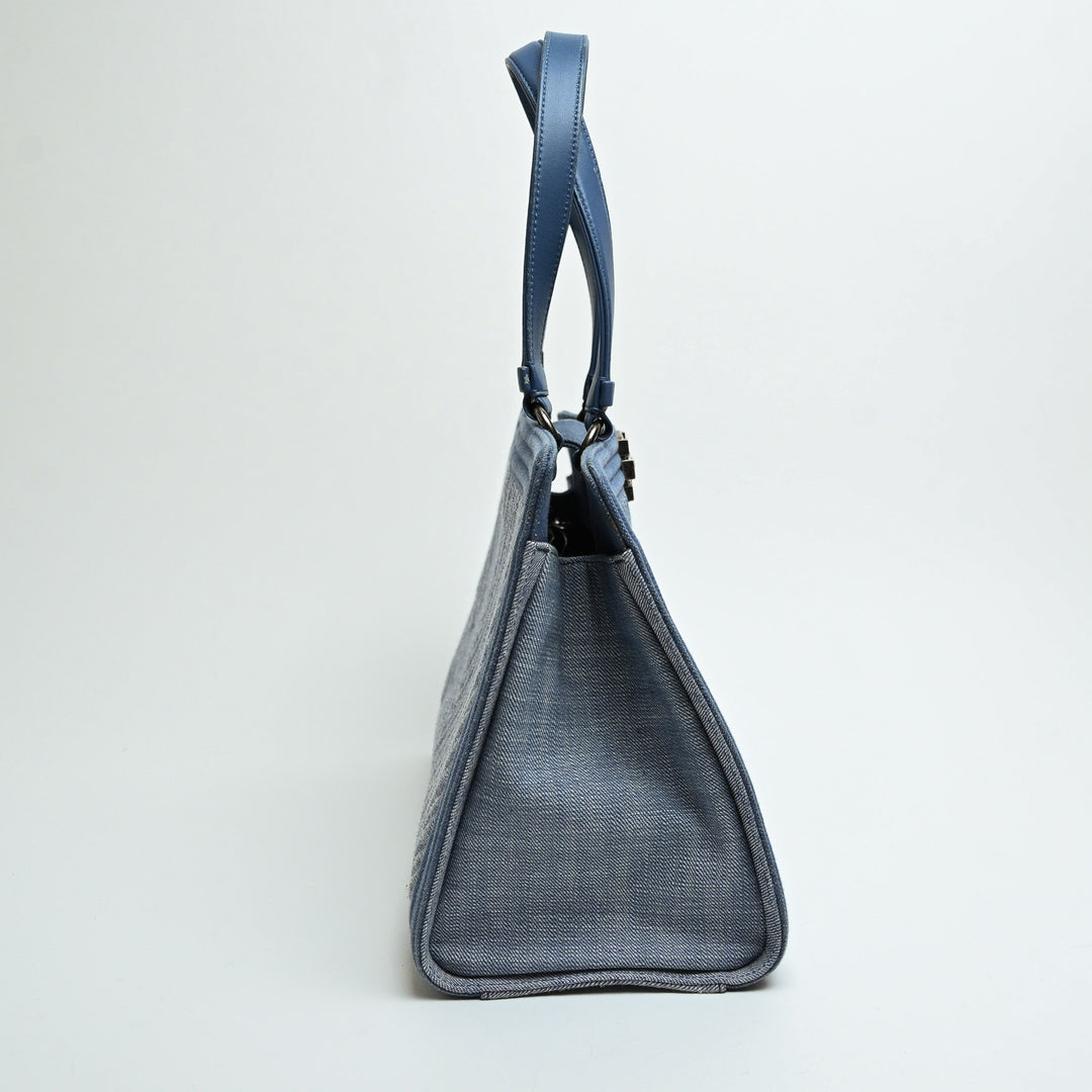 Pre-Loved Chanel™ Blue Quilted Chevron Denim Boy Tote Bag