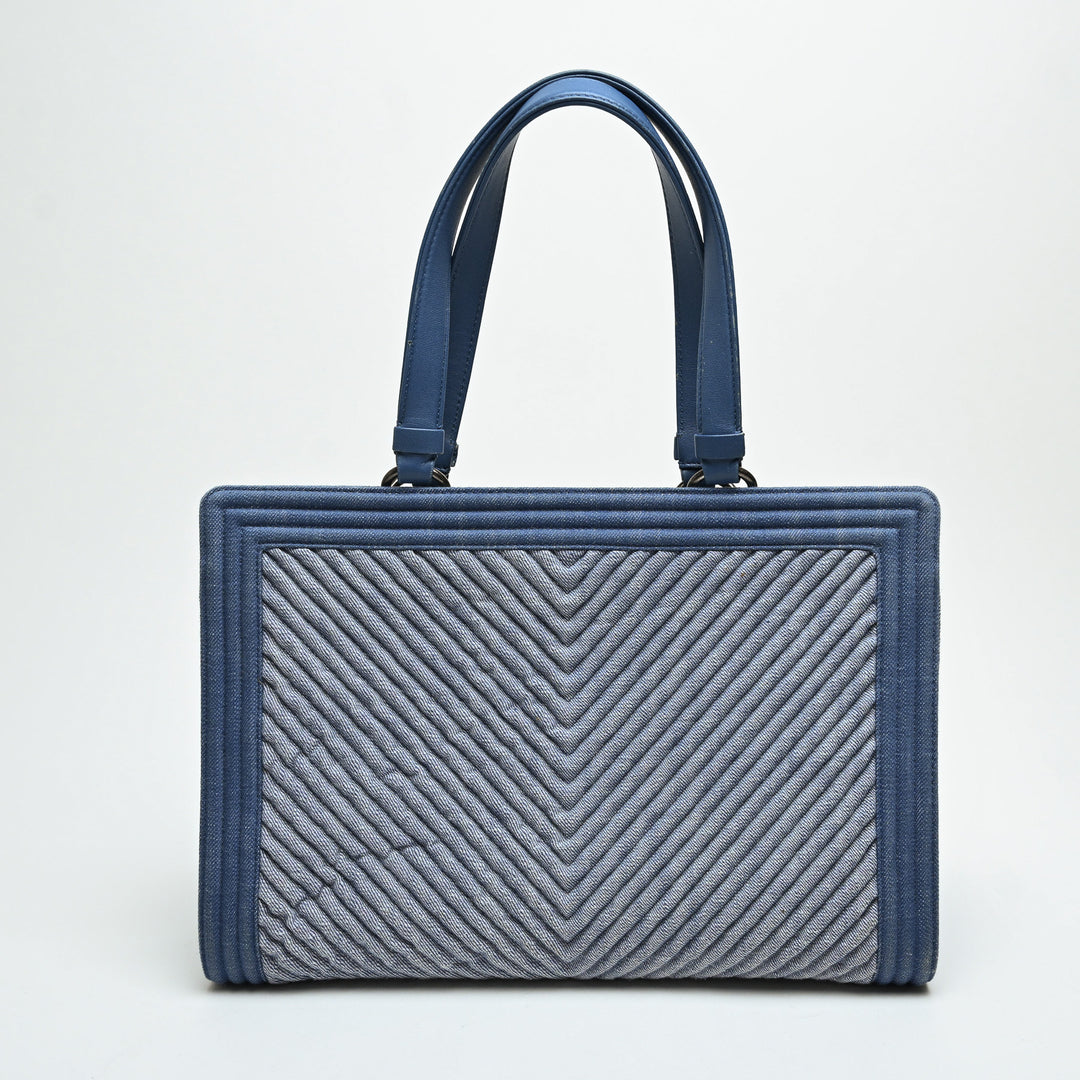 Pre-Loved Chanel™ Blue Quilted Chevron Denim Boy Tote Bag