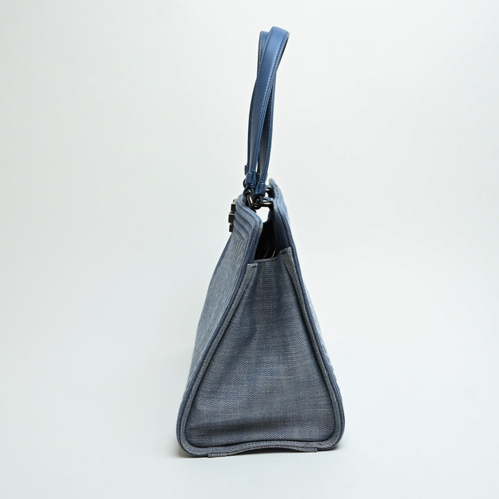 Pre-Loved Chanel™ Blue Quilted Chevron Denim Boy Tote Bag
