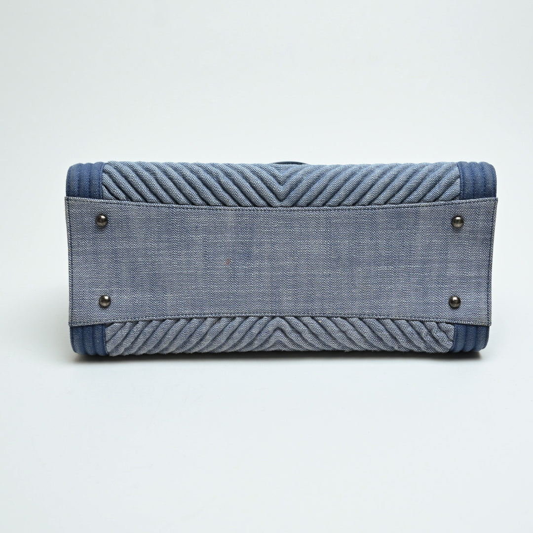 Pre-Loved Chanel™ Blue Quilted Chevron Denim Boy Tote Bag
