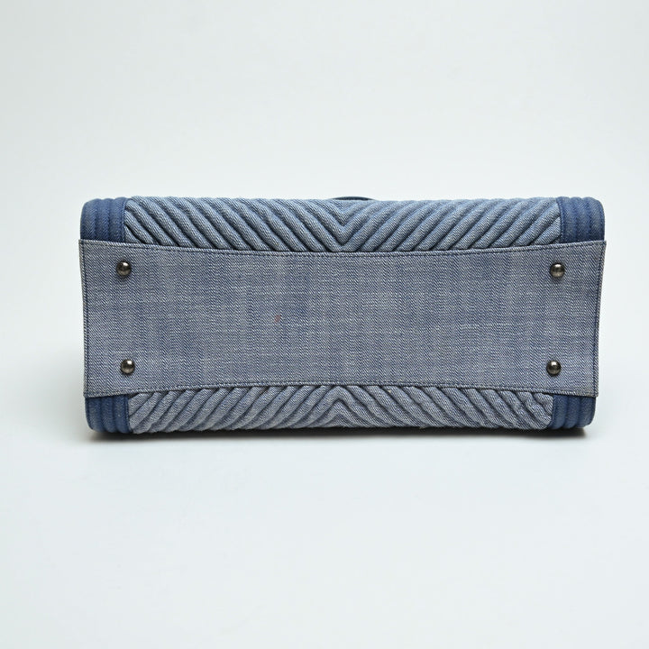 Pre-Loved Chanel™ Blue Quilted Chevron Denim Boy Tote Bag