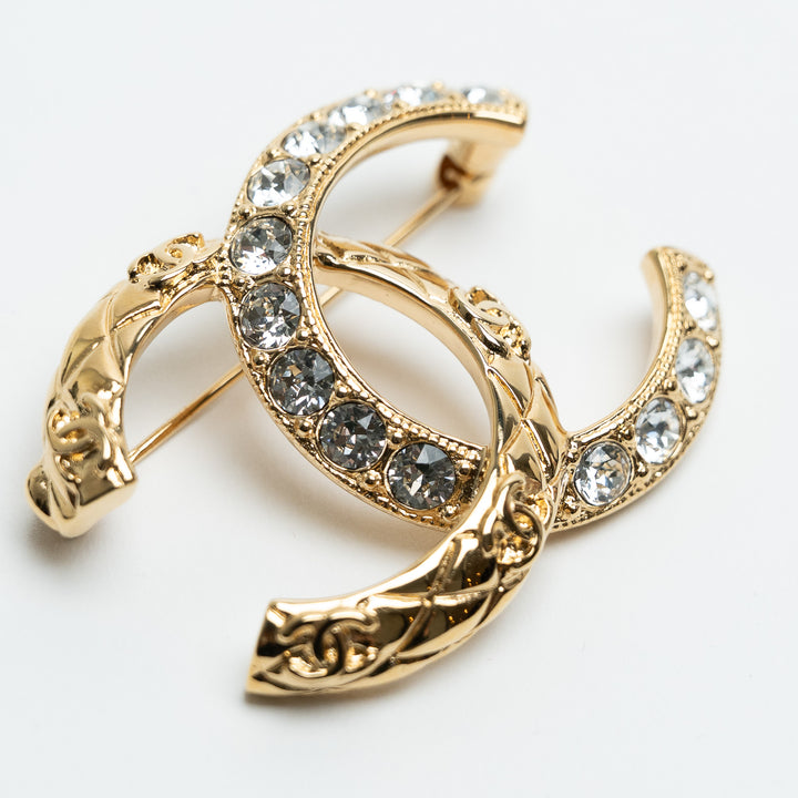 Pre-Loved Chanel™ Gold-Tone Crystal Embellished Interlocking Logo Brooch
