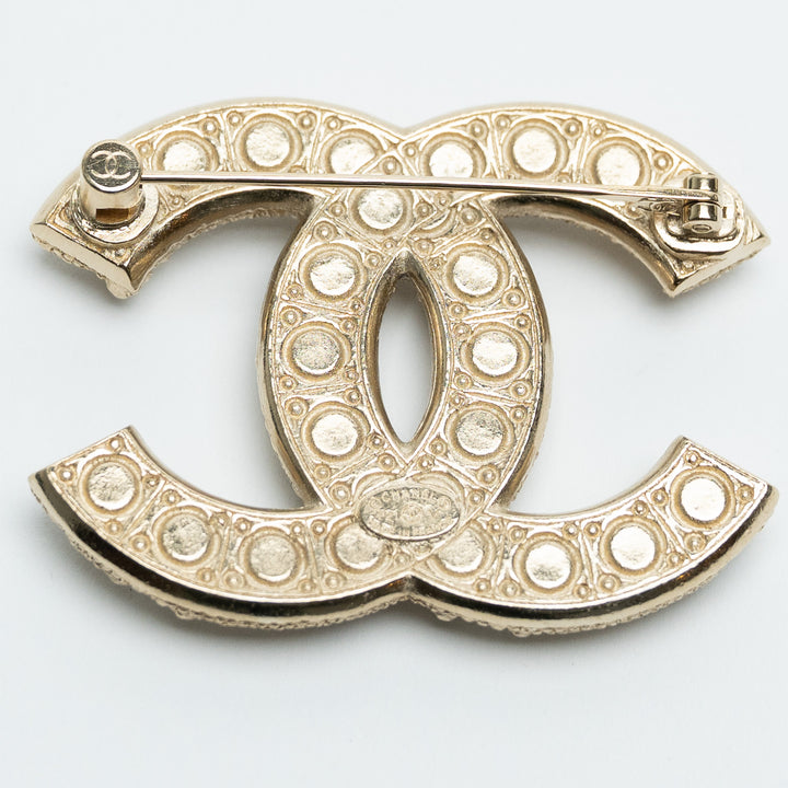Pre-Loved Chanel™ Gold-Tone Interlocking Logo Brooch with Faux Pearls & Crystals