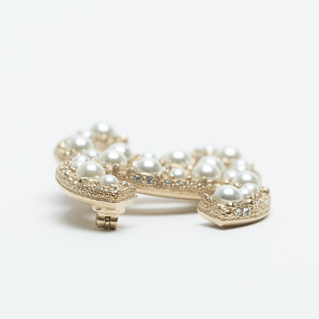 Pre-Loved Chanel™ Gold-Tone Interlocking Logo Brooch with Faux Pearls & Crystals
