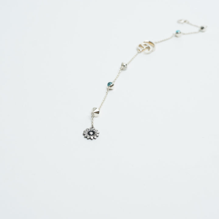 Gucci Sterling Silver GG Marmont Flower Bracelet with Blue Topaz, Mother of Pearl, & Turquoise Resin