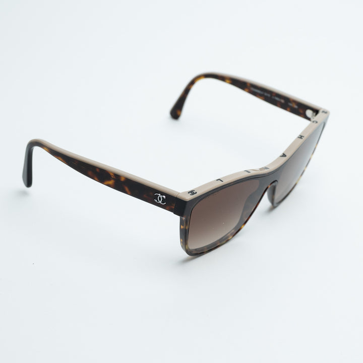 Pre-Loved Chanel™ Square Frame Tortoise Sunglasses with Lettering Detail