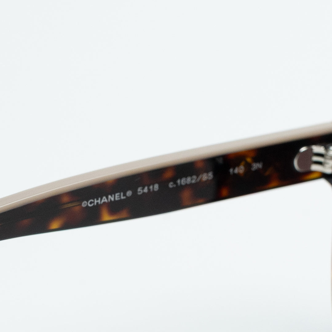 Pre-Loved Chanel™ Square Frame Tortoise Sunglasses with Lettering Detail