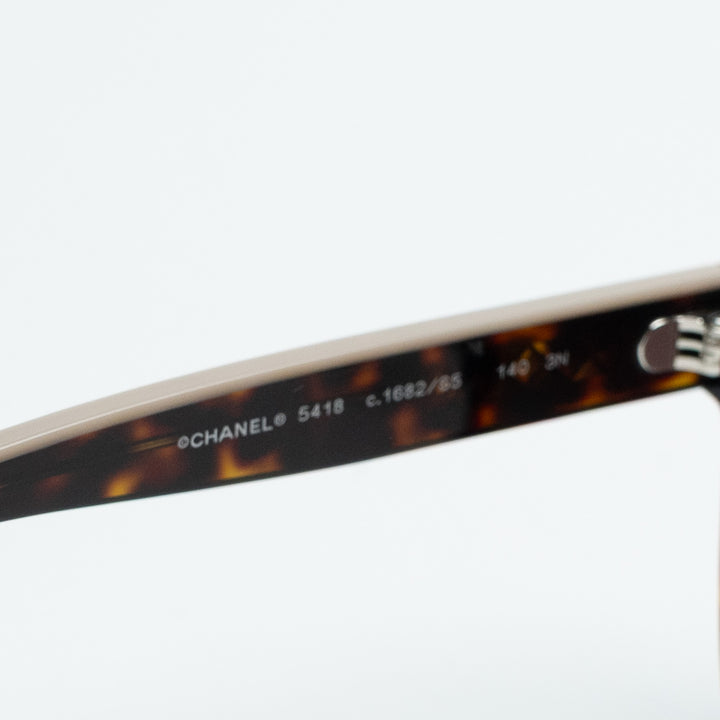 Pre-Loved Chanel™ Square Frame Tortoise Sunglasses with Lettering Detail