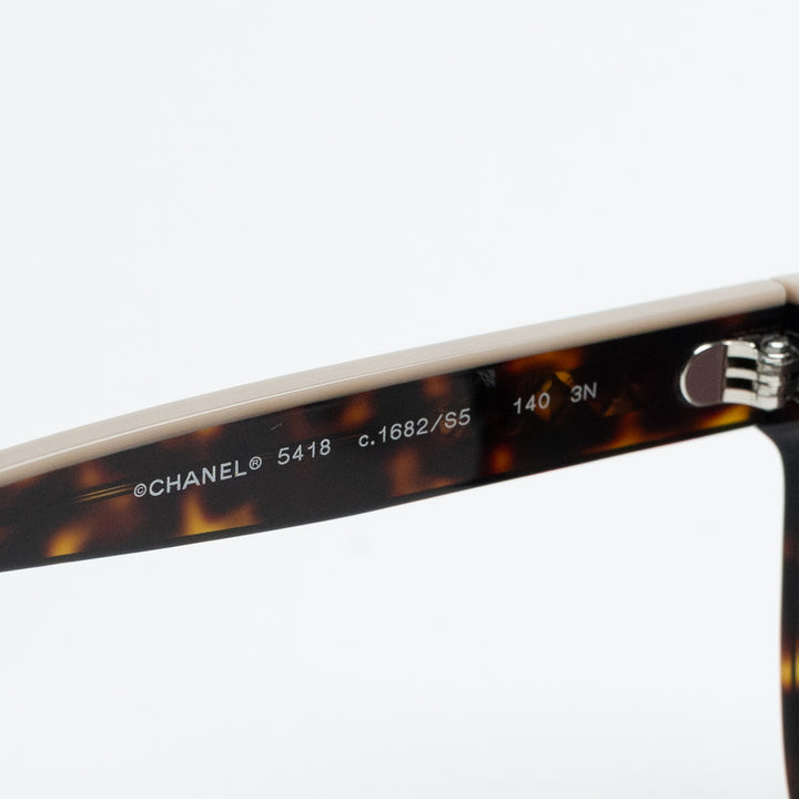 Pre-Loved Chanel™ Square Frame Tortoise Sunglasses with Lettering Detail