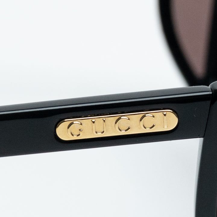 Gucci Black Round Frame Sunglasses with Gold Logo & Cutout