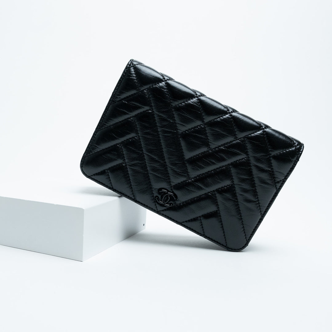 Pre-Loved Chanel™ Black Quilted Aged Lambskin Leather Wallet-On-Chain
