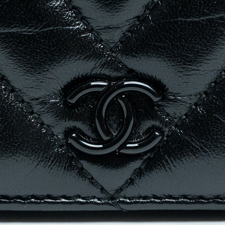 Pre-Loved Chanel™ Black Quilted Aged Lambskin Leather Wallet-On-Chain