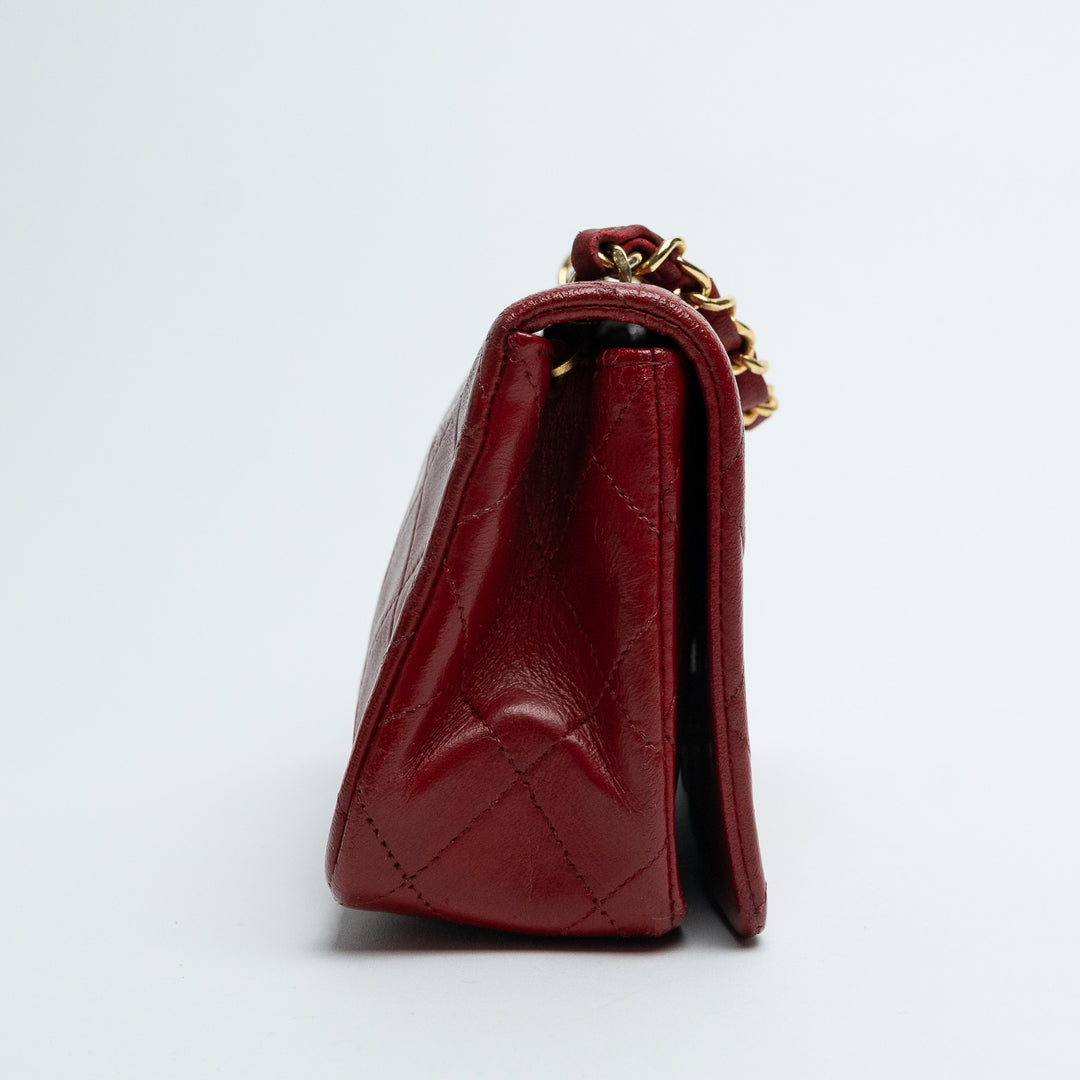 Pre-Loved Chanel™ Red Quilted Calfskin Leather Vintage Mini Flap Bag
