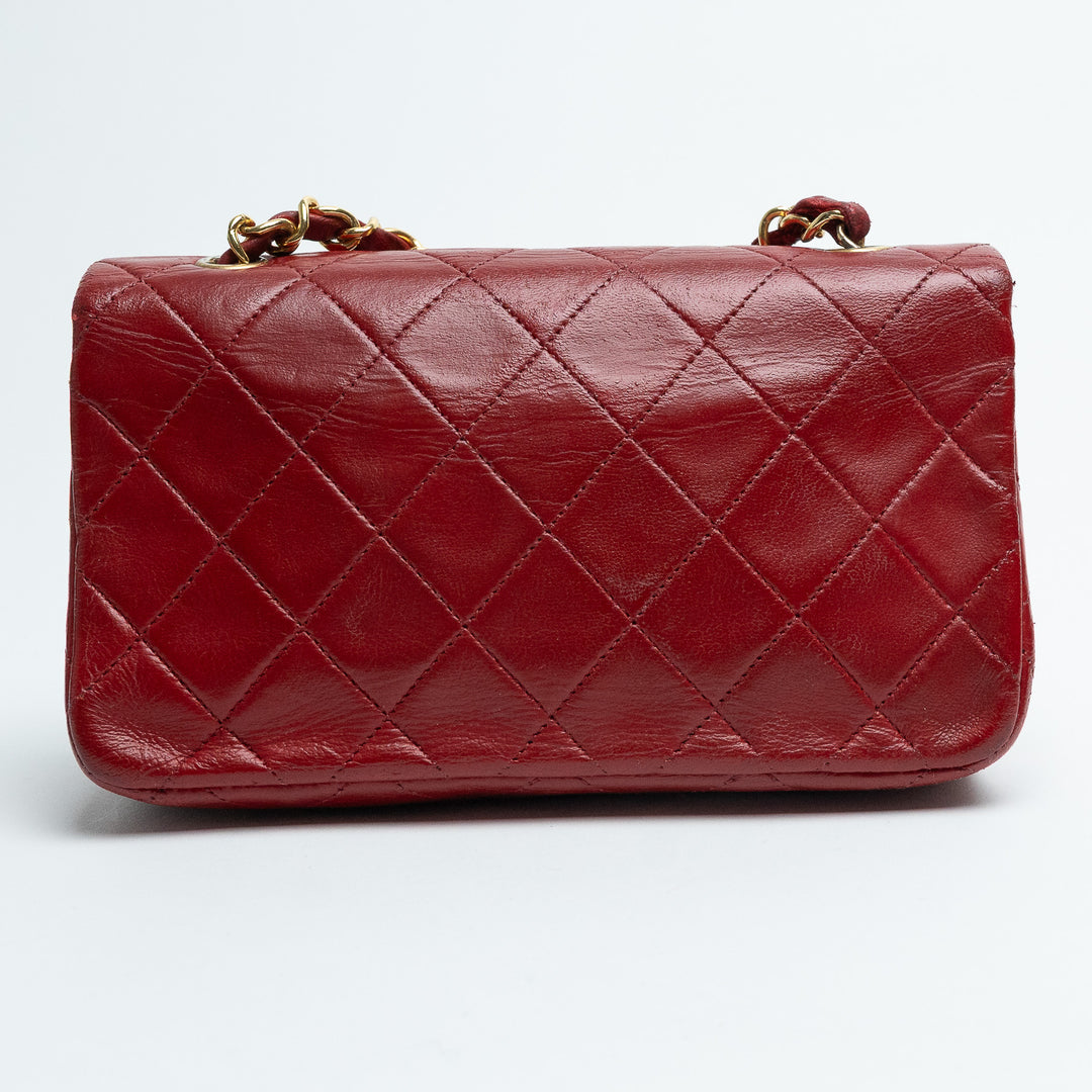 Pre-Loved Chanel™ Red Quilted Calfskin Leather Vintage Mini Flap Bag