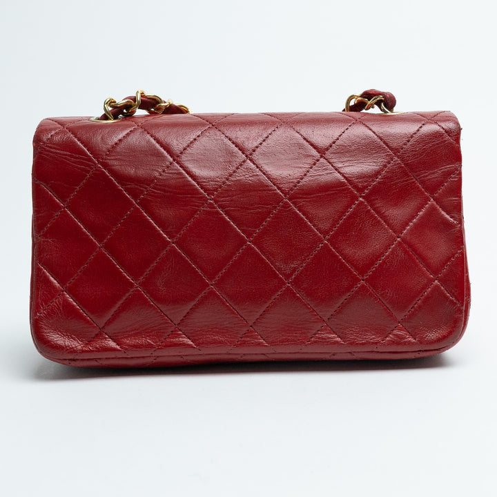 Pre-Loved Chanel™ Red Quilted Calfskin Leather Vintage Mini Flap Bag