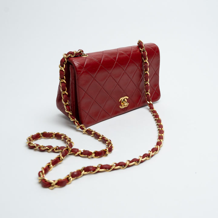 Pre-Loved Chanel™ Red Quilted Calfskin Leather Vintage Mini Flap Bag