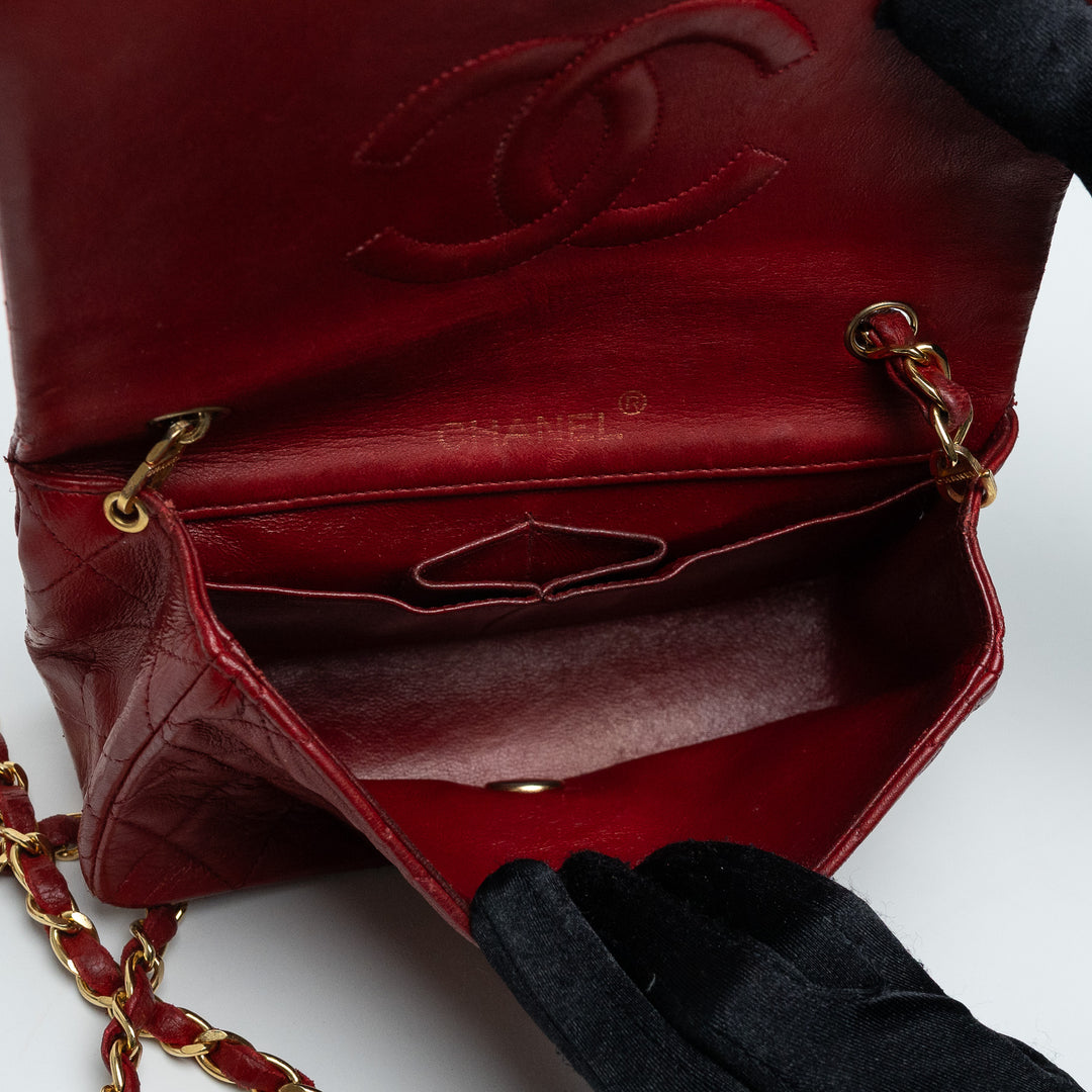 Pre-Loved Chanel™ Red Quilted Calfskin Leather Vintage Mini Flap Bag