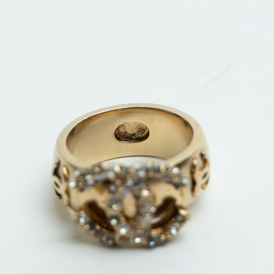 Pre-Loved Chanel™ Gold Tone Interlocking Logo Crystal Embellished Ring Size 53
