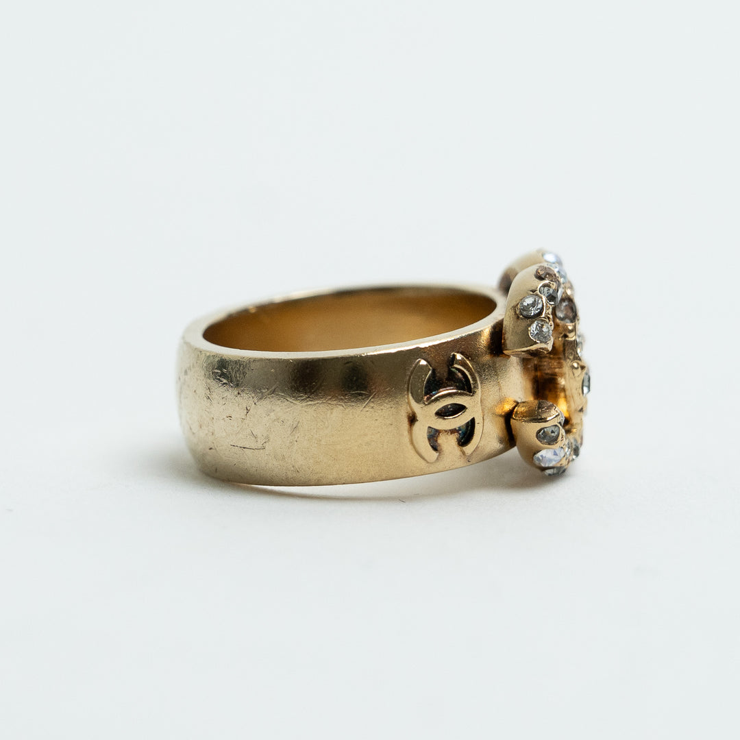 Pre-Loved Chanel™ Gold Tone Interlocking Logo Crystal Embellished Ring Size 53