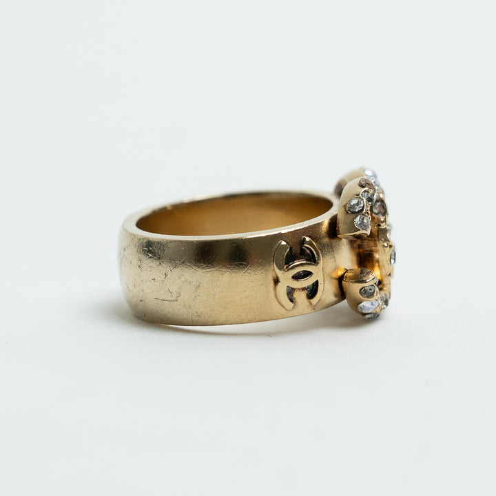 Pre-Loved Chanel™ Gold Tone Interlocking Logo Crystal Embellished Ring Size 53