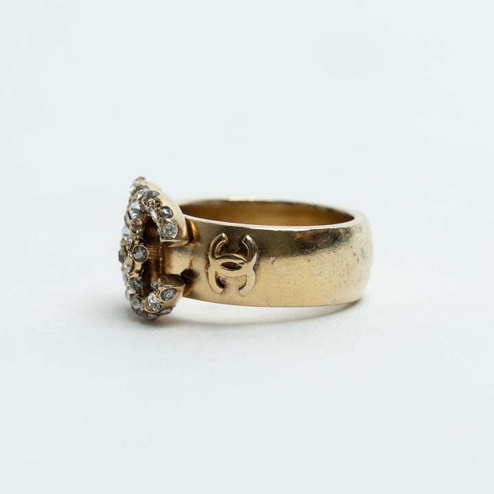 Pre-Loved Chanel™ Gold Tone Interlocking Logo Crystal Embellished Ring Size 53