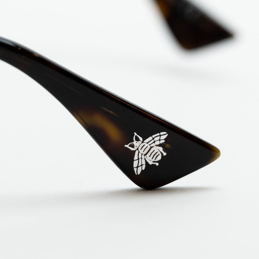 Gucci Tortoise Shell Sunglasses with Silver Details and Bee Motif