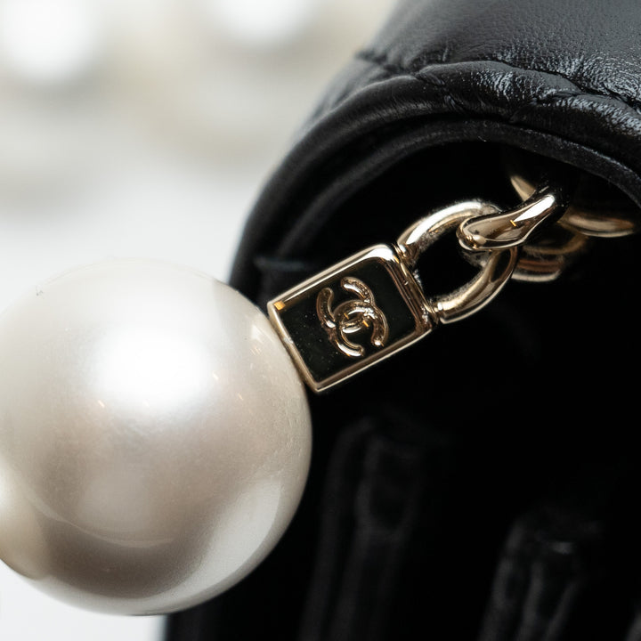 Pre-Loved Chanel™ Black Quilted Lambskin Oversized Pearl Strap Compact Wallet On Chain