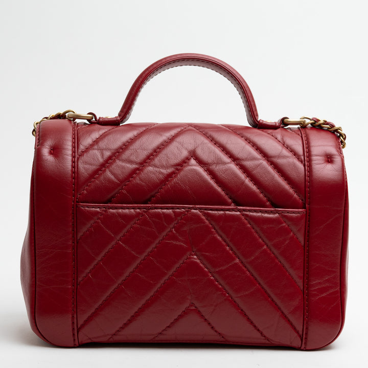 Pre-Loved Chanel™ Red Calfskin Chevron Top Handle Flap Bag
