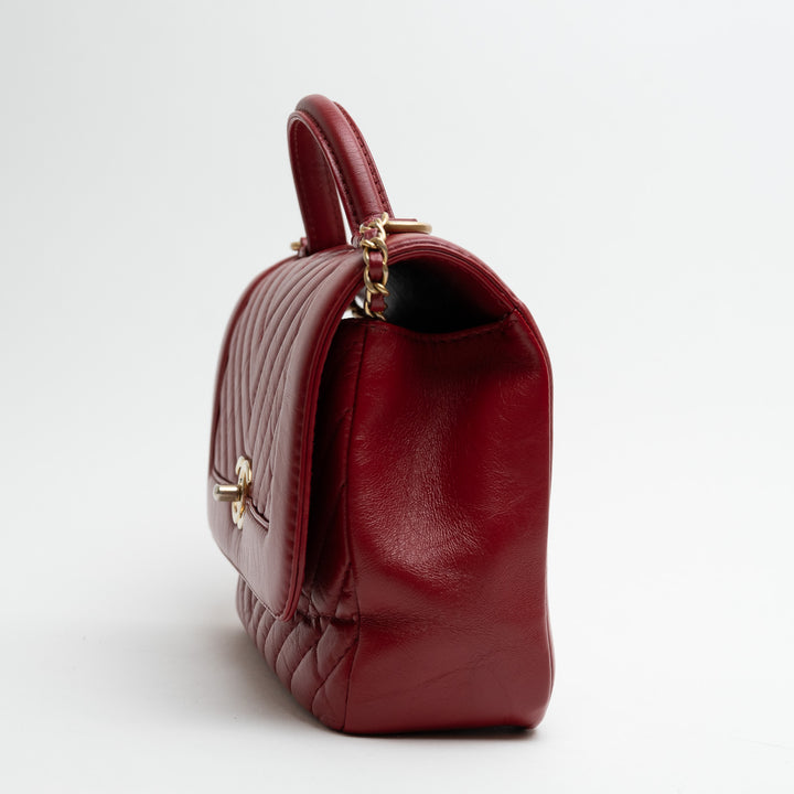 Pre-Loved Chanel™ Red Calfskin Chevron Top Handle Flap Bag