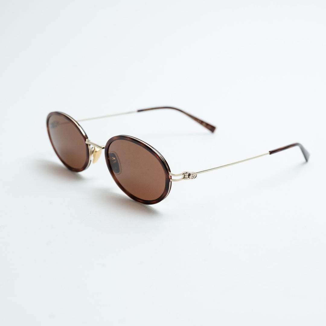 Gucci Tortoise Shell Oval Frame Sunglasses