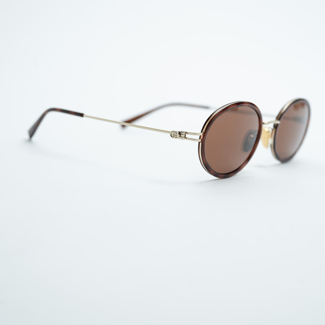 Gucci Tortoise Shell Oval Frame Sunglasses