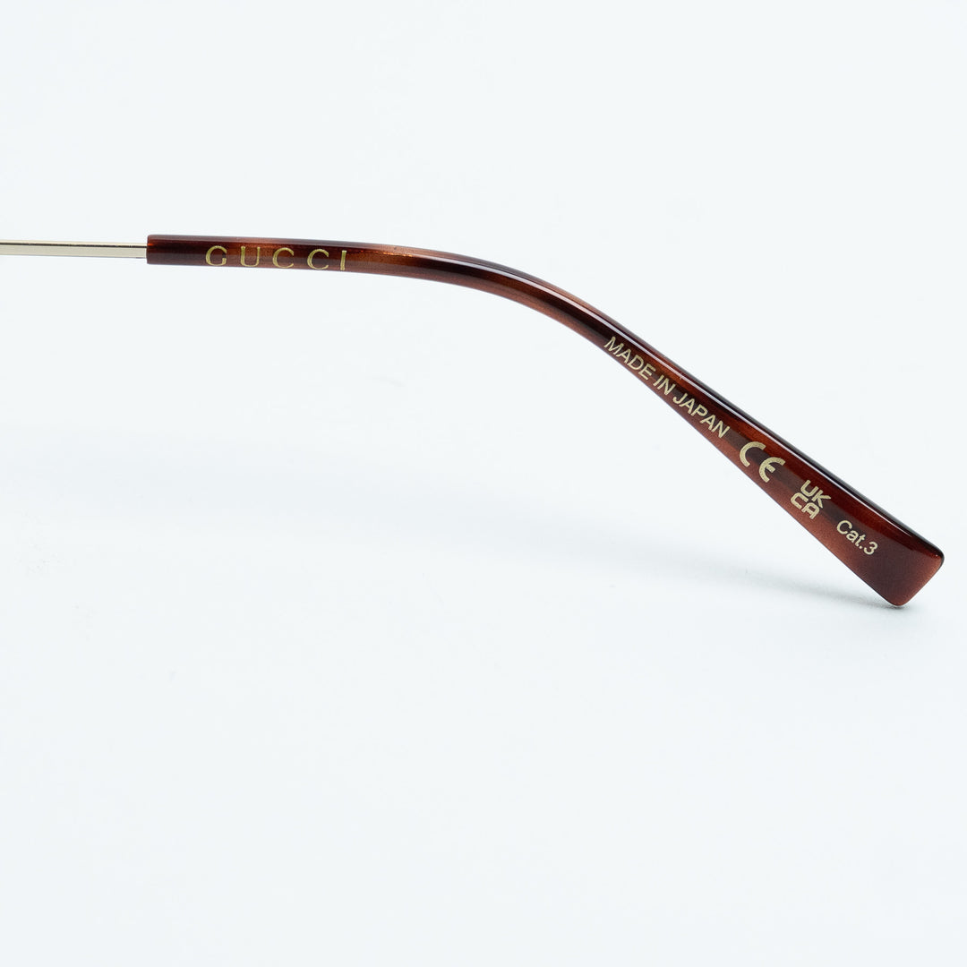 Gucci Tortoise Shell Oval Frame Sunglasses