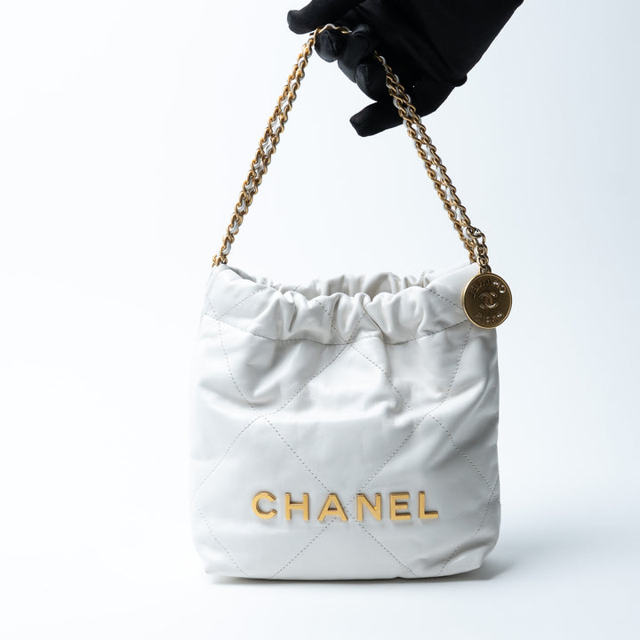 Pre-Loved Chanel™ White Lambskin Mini 22 Crossbody Bag with Gold Hardware