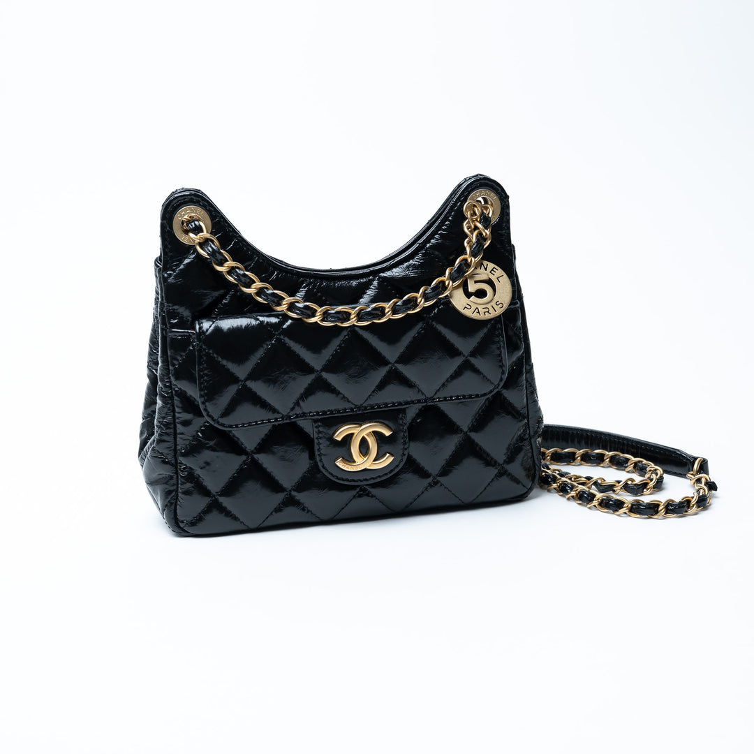 Pre-Loved Chanel™ Black Shiny Aged Calfskin Leather Small Wave Hobo Bag