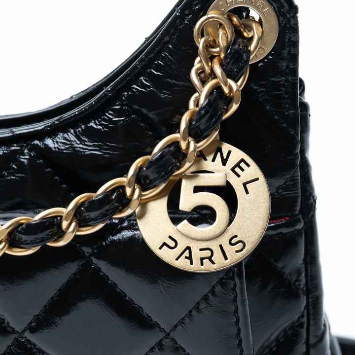 Pre-Loved Chanel™ Black Shiny Aged Calfskin Leather Small Wave Hobo Bag