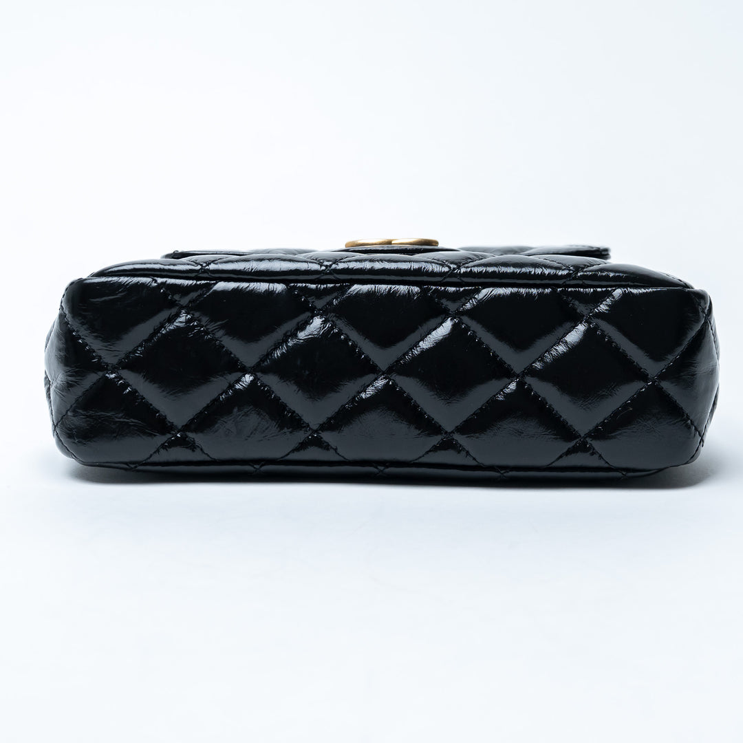 Pre-Loved Chanel™ Black Shiny Aged Calfskin Leather Small Wave Hobo Bag