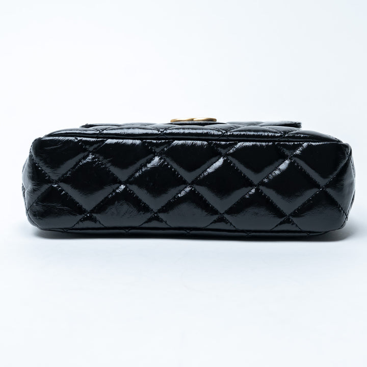 Pre-Loved Chanel™ Black Shiny Aged Calfskin Leather Small Wave Hobo Bag