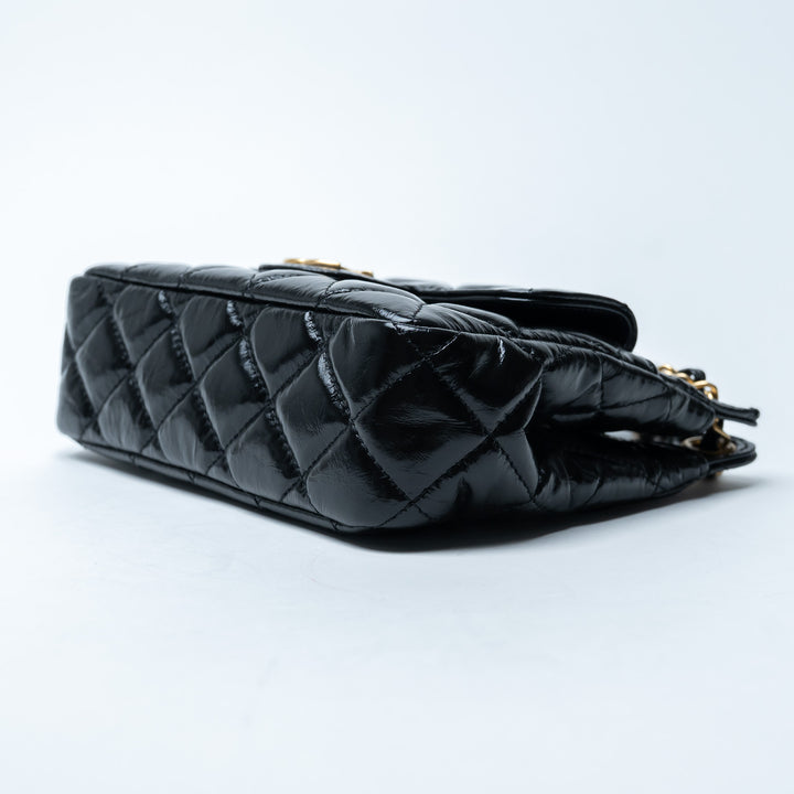 Pre-Loved Chanel™ Black Shiny Aged Calfskin Leather Small Wave Hobo Bag
