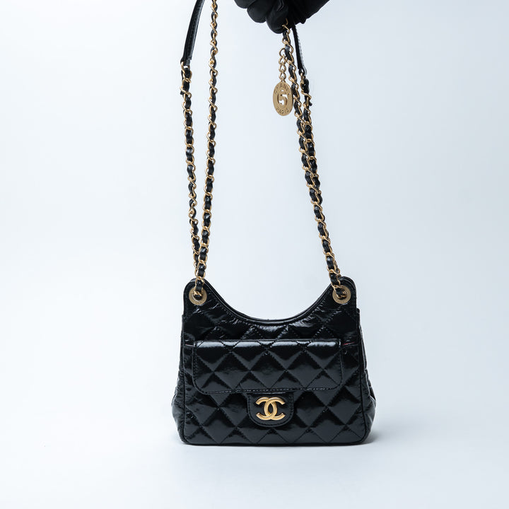 Pre-Loved Chanel™ Black Shiny Aged Calfskin Leather Small Wave Hobo Bag