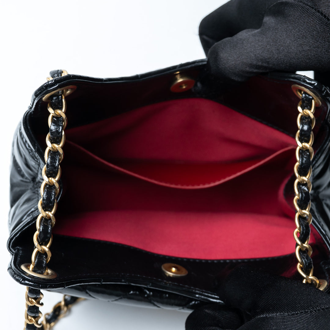 Pre-Loved Chanel™ Black Shiny Aged Calfskin Leather Small Wave Hobo Bag