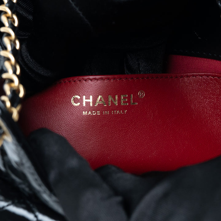 Pre-Loved Chanel™ Black Shiny Aged Calfskin Leather Small Wave Hobo Bag