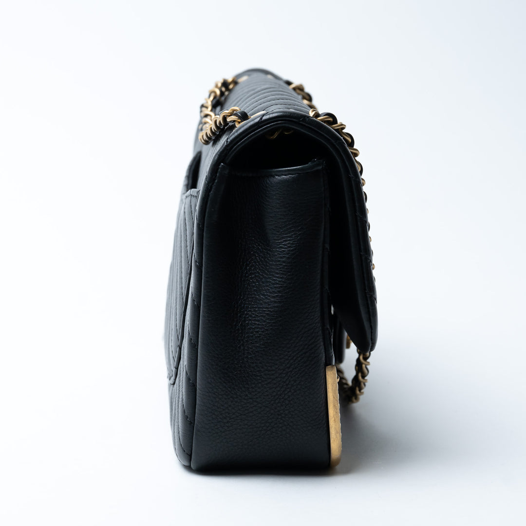 Pre-Loved Chanel™ Black Lambskin Leather Rock The Corner Flap Bag