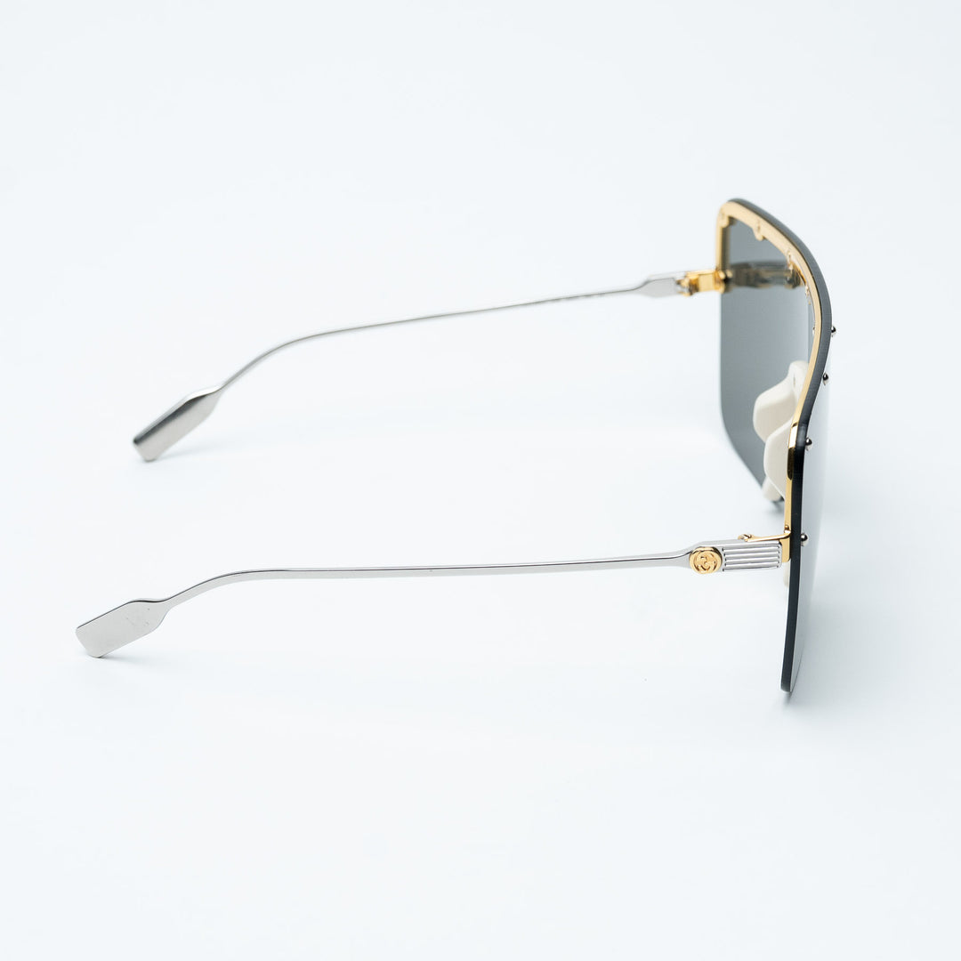 Gold and Gray Metal Rimless Shield Sunglasses. (view 3)