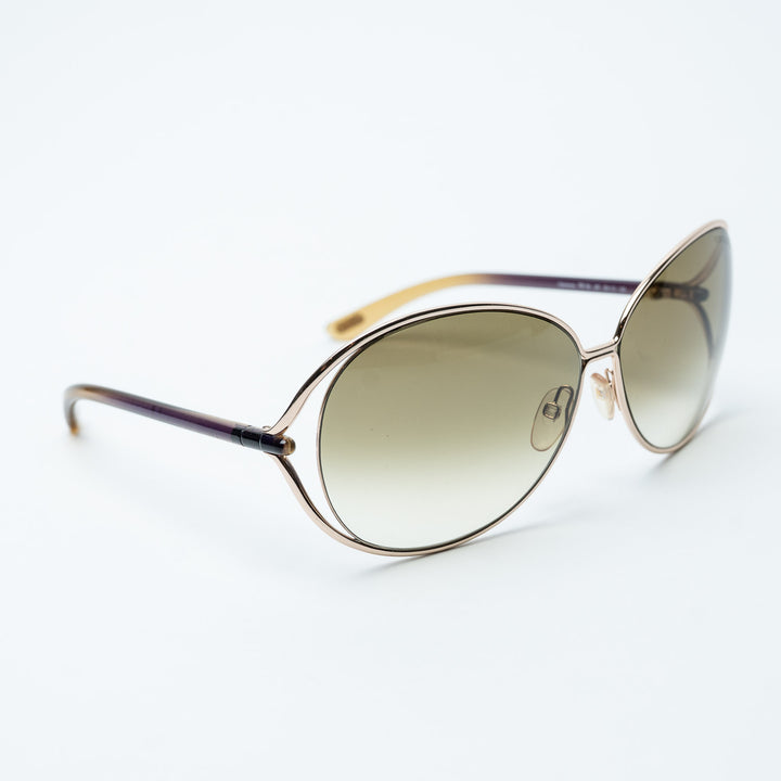 Gold and Green Metal Oversized Round Sunglasses. (front)