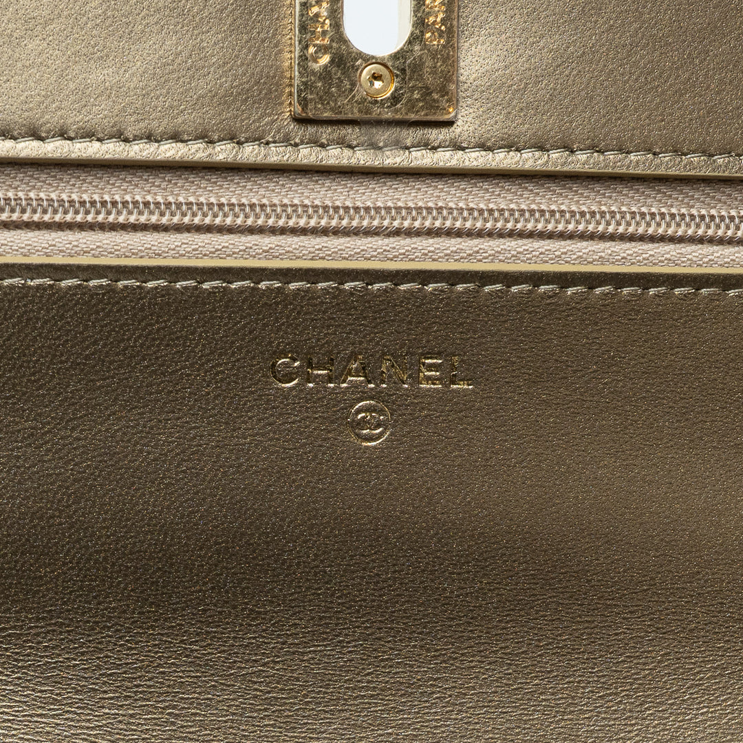 Gold Metallic Lambskin Quilted Wallet on Chain. (interior stamp)
