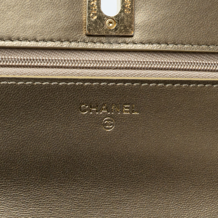 Gold Metallic Lambskin Quilted Wallet on Chain. (interior stamp)